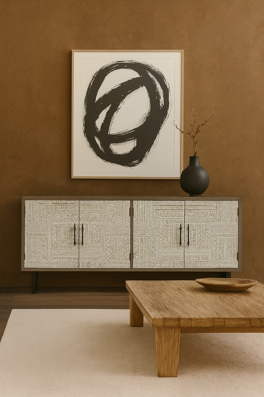 Modern interior with a textured wall, abstract art, and wooden furniture.