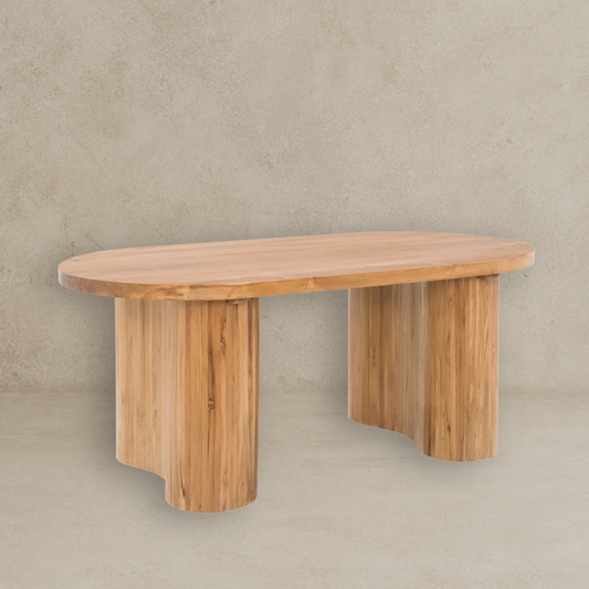 Wooden wall-mounted shelf against a beige wall