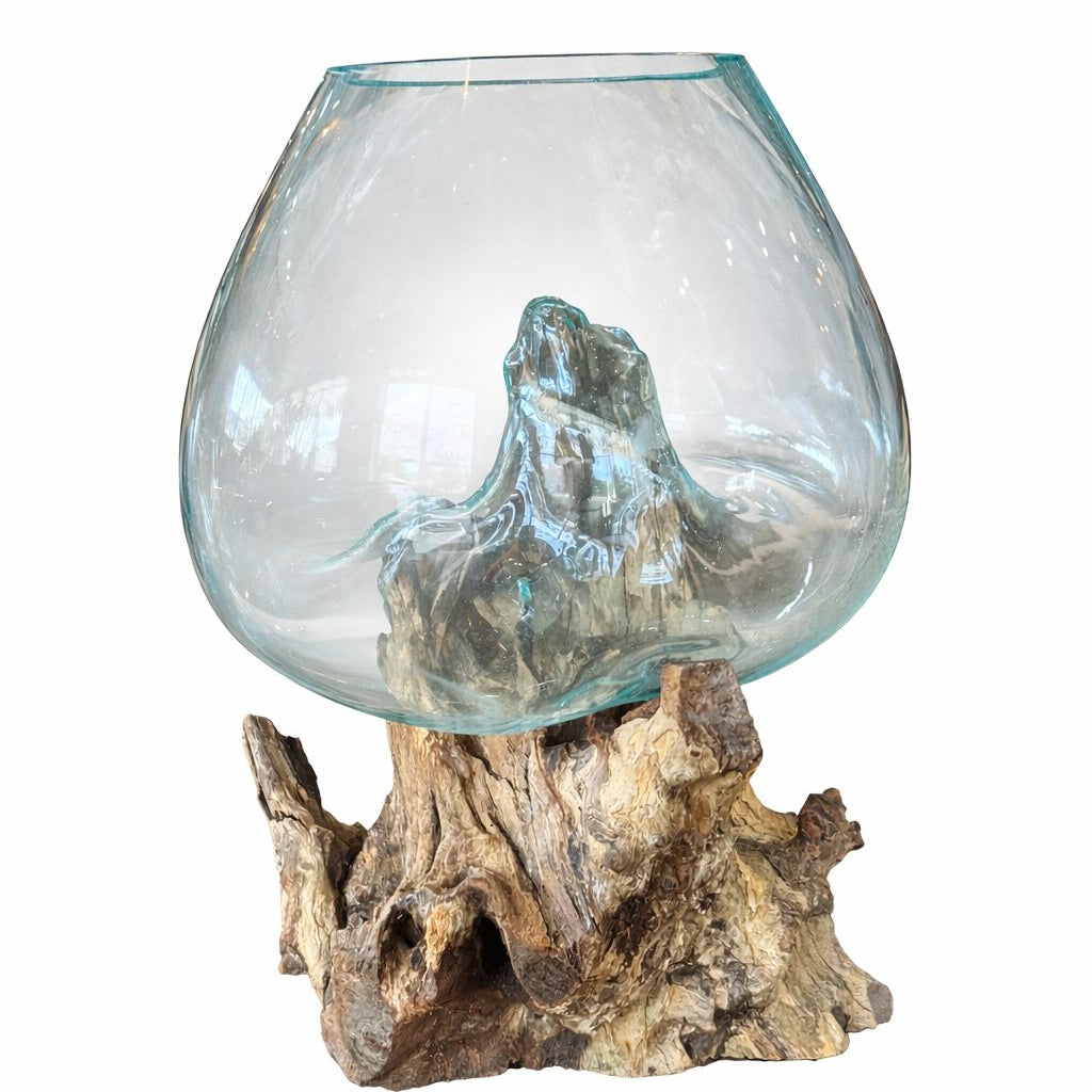 Glass vase with a natural wood base on a white background