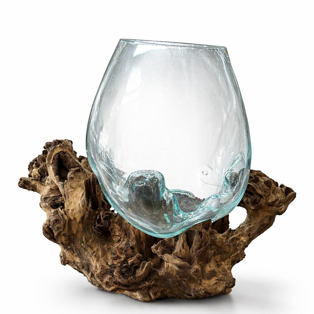 Clear glass wine glass on a natural wood base against a white background