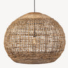 A handwoven pendant light shade made of banana-abaca plant fiber with a reclaimed teak wood top, in a round shape, intended to diffuse light.
