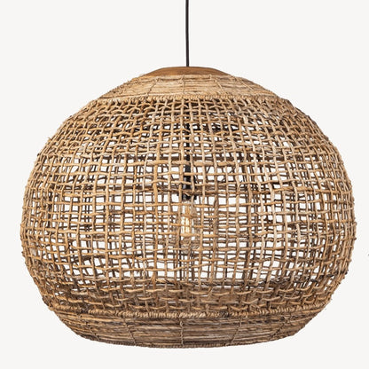 A handwoven pendant light shade made of banana-abaca plant fiber with a reclaimed teak wood top, in a round shape, intended to diffuse light.