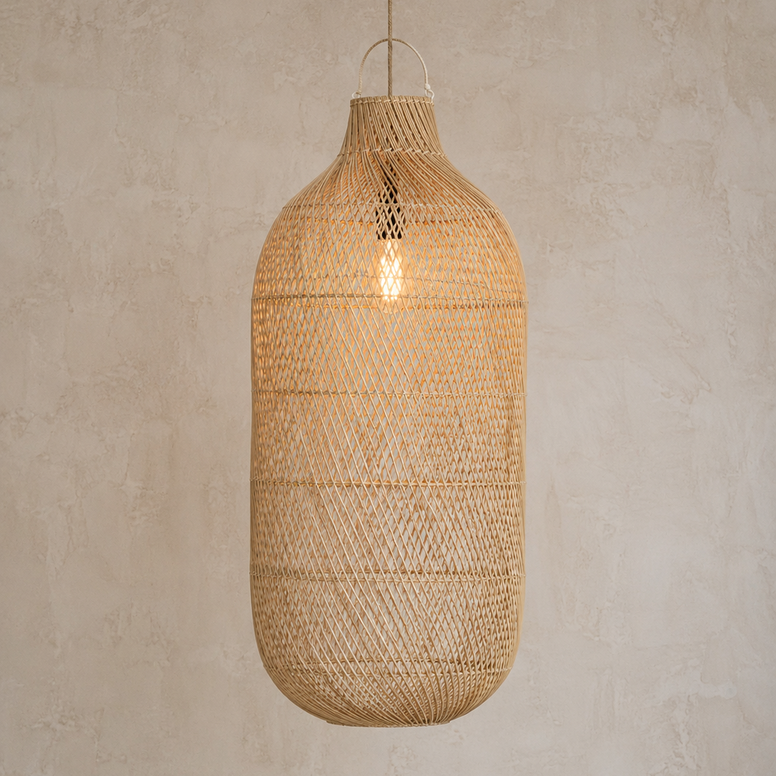 Woven rattan pendant light against a neutral wall